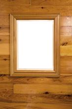 a wooden picture frame of a wood panels wall