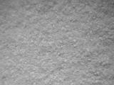 Full frame background of salt grains with copy space for concept about food preservation or winter weather