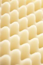 Macro view on rows of curvy foam insulation used for fragile objects or insulating sound