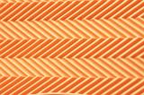 Herringbone style ribs orange background pattern with subtle lines as on an athletic shoe