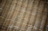 macro image of a woven wicker surface from a chair