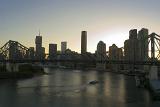 A twilight view of the Story bridge and tall buildings in central Brisbane
