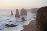 The twelve Apostles collection of limestone rock stacks in Australia in Port Campbell National Park, Victoria viewed along the beach on a misty day