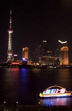 a view of the riverfton and landmark building in shanghai at night