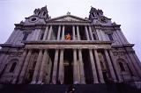 a low angle view of the doors to st pauls cathedral in london
