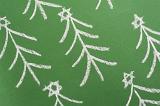 a background of white chalk trees with stars atop drawn on green paper