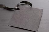 a plain black paper gift tag with space to add text