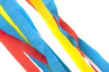 Strands of Blue, Yellow and Red Decorative Paper Streamers Across White Background