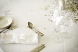 a white place setting at a wedding breakfast