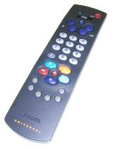 Television universal remote control lying buttons and keypad uppermost on a white background angled away from the viewer