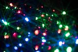 sparkling background of twinkly fairy lights out of focus and ethereal