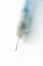 a macro image of the tip of a medical hypodermic needle