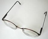 High Angle View of Pair of Eyeglasses with Simple Frames on White Background