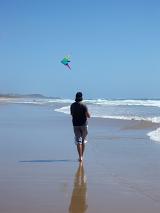 wind power hobby, flying a kite on the beach