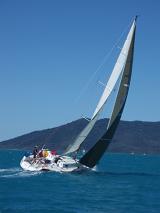 a racing yach sailing in the whitsundays, australia