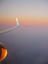 sunset from an aeroplane window, travel, holidays and vacation