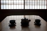 japanese tea pot and cups set out ready to enjoy a cup of green tea