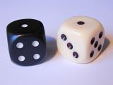 snake eyes a pair of black and white gaming die - a game of chance
