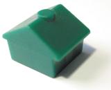 a green plastic board game house
