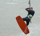 an airborne kite surfer