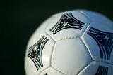close up on a white leather soccer ball