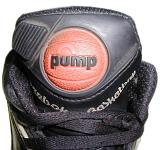 close up on the front of a black basketball sneaker on a white background