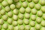 a tennis related background of half tennis balls