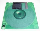 Green sony classic 90s double density floppy disk - not property released