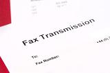 Background closeup of a blank white fax transmission form with header