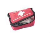 Portable first aid kit in a zipped container suitable for use in emergencies on a white studio background