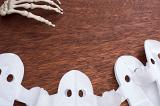 a background or lay flat  image of halloween decorations laid on a wood surface