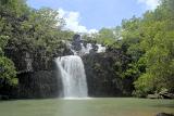 relaxing tropical waters, a place to cool off on a hot day under a waterfall